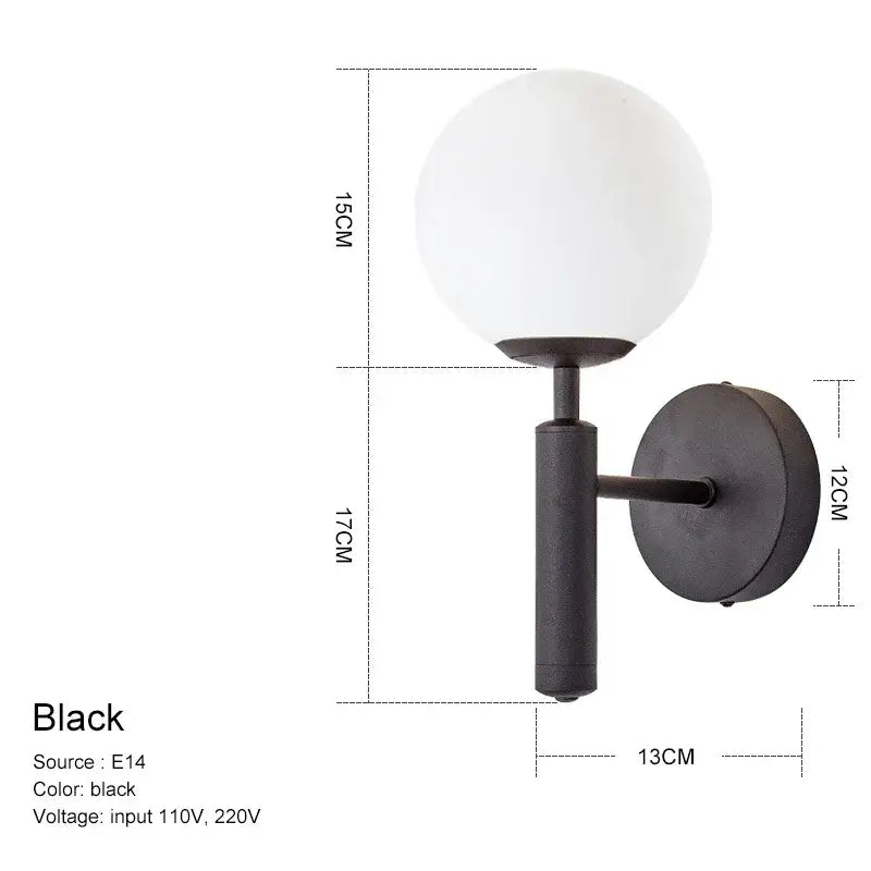 Black wall sconce with frosted glass globe and matte black metal base for modern decorbites glass ball mirror wall lights