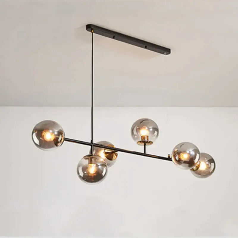 Modern black metal ball pendant chandelier with six smoked glass globes for dining room decorbites glass ball lighting