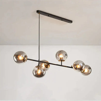 Modern black metal ball pendant chandelier with six smoked glass globes for dining room decorbites glass ball lighting