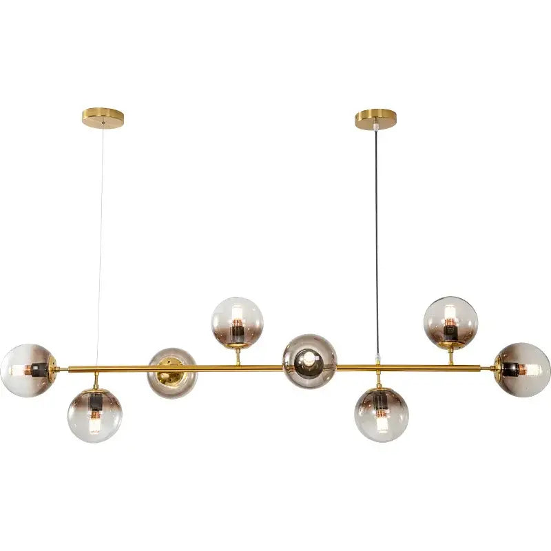 Modern gold glass ball pendant chandelier with spherical globes and exposed filament bulbs for dining room decorbites lighting