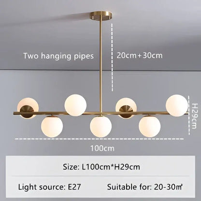 Modern gold glass ball pendant chandelier with brass finish and six frosted globes for dining room decorbites glass ball