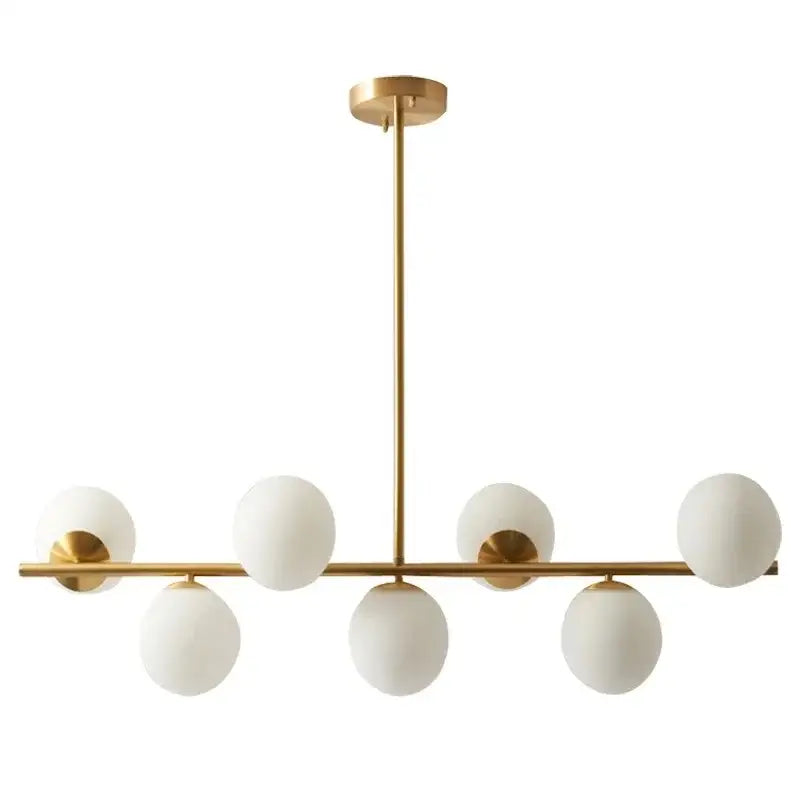 Modern gold glass ball pendant chandelier with six frosted glass globes in a linear design for dining room decorbites glass ball
