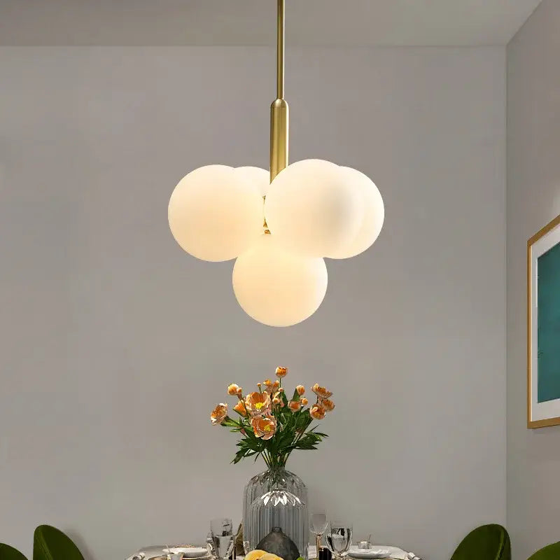 Modern gold glass ball pendant chandelier with three frosted glass globe shades for dining room decorbites glass ball