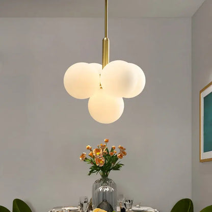 Modern gold glass ball pendant chandelier with three frosted glass globe shades for dining room decorbites glass ball