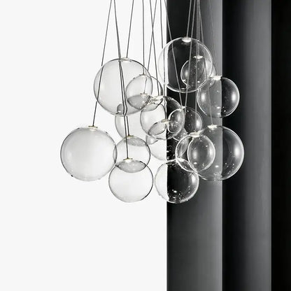 Modern gold glass ball pendant chandelier with clear glass sphere pendant light fixture in minimalist design
