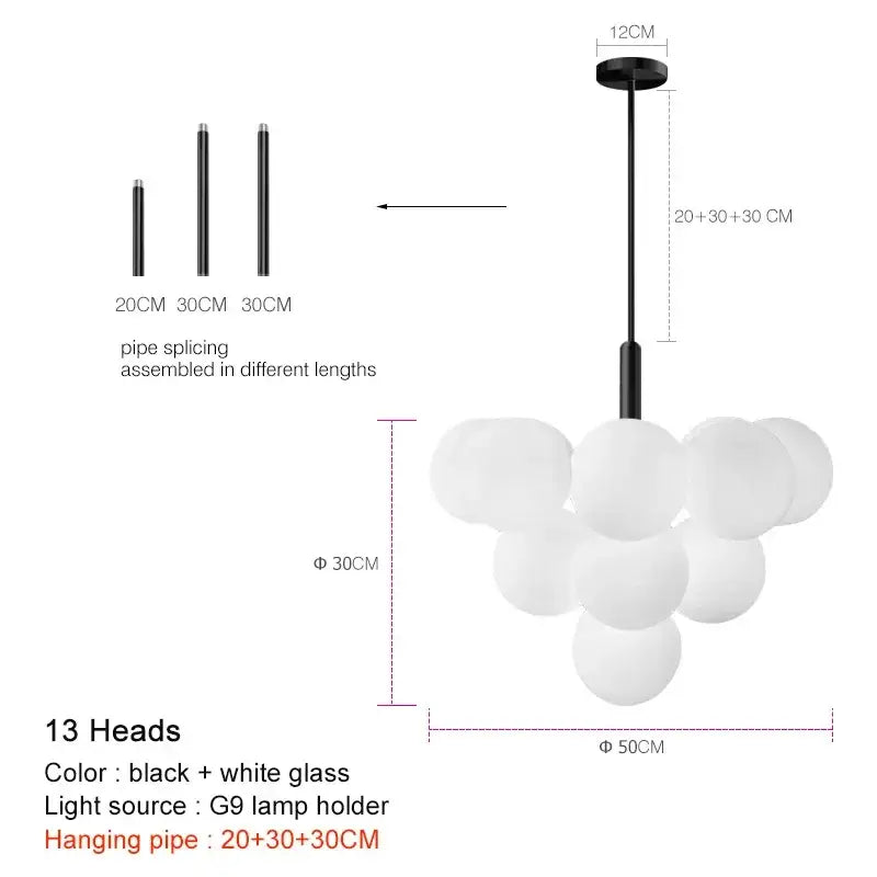 Modern gold glass ball pendant chandelier featuring a white glass globe pendant light with black metal pipe