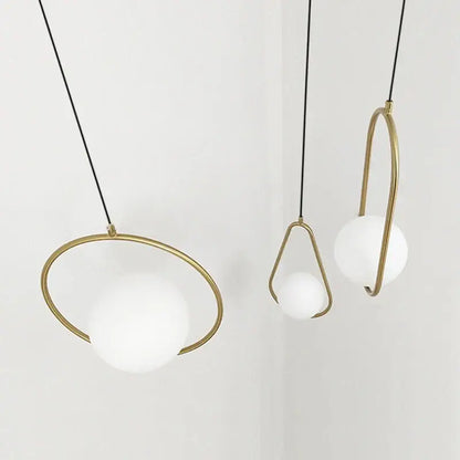 Modern gold glass ball pendant light with three frosted white glass spheres and metal frames for dining room decorbites glass ball pendant