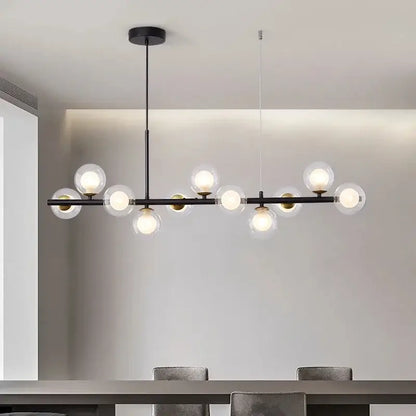 Modern black metal pendant light with clear glass ball bulbs and gold accents for dining room decorbites glass ball chandelier