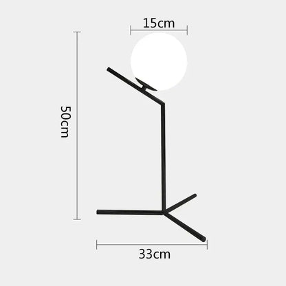 Modern gold and black metal table lamp with frosted white glass ball shade for bedroom decorbites glass ball table