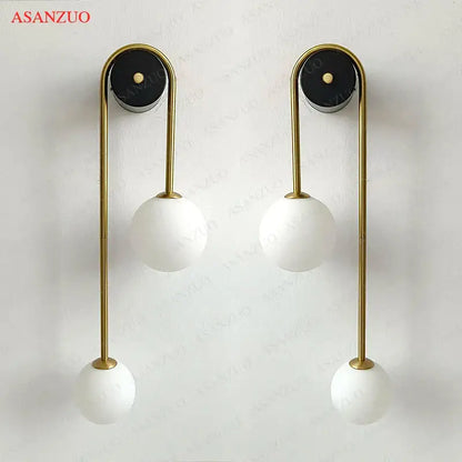 Modern gold glass ball wall lamp with frosted glass shades and black mounts for bedroom decorbites glass ball sconce
