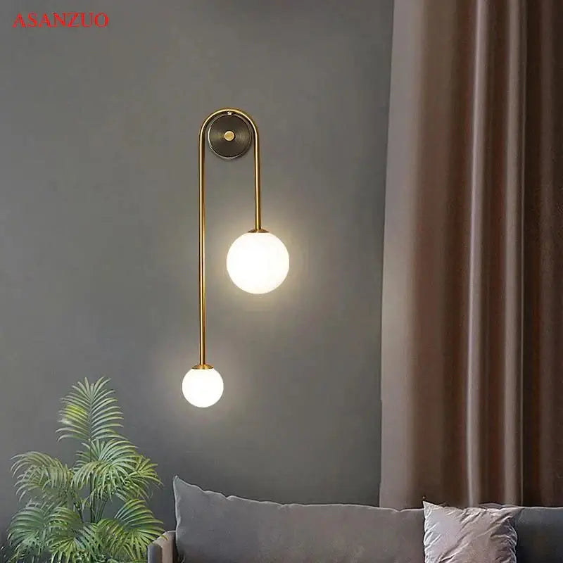 Modern gold glass ball wall lamp with dual frosted glass shades for bedroom decorbites glass ball sconce