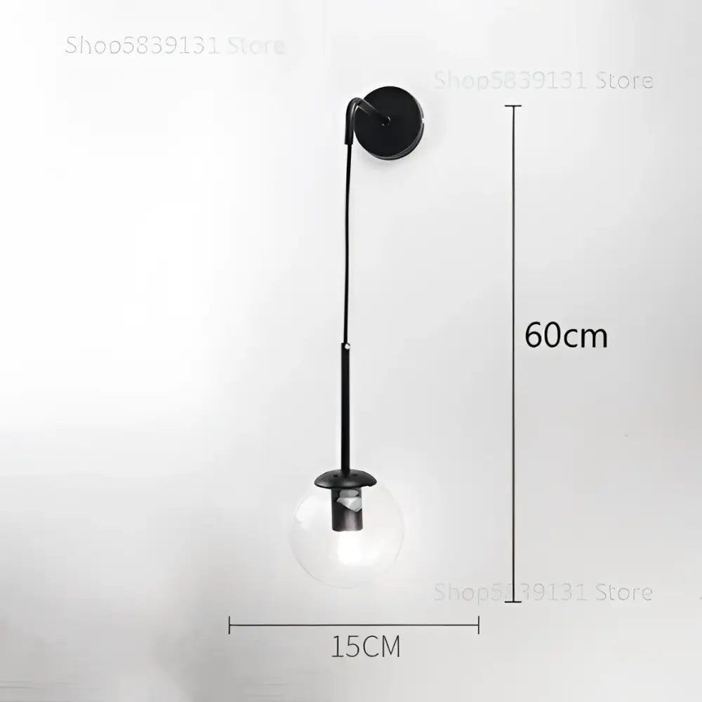 Modern gold glass ball wall lamp with black metal sconce and clear glass globe bulb for bedroom decorbites decor