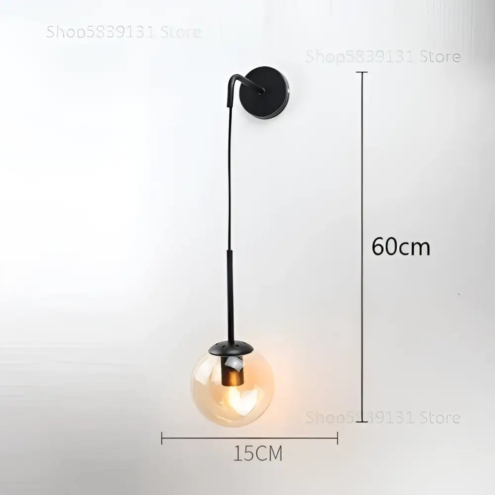 Black metal wall lamp with spherical glass ball bulb modern gold glass ball bedroom sconce decorbites glass ball