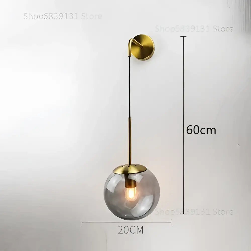 Modern gold glass ball wall lamp with brass finish and spherical glass ball by decorbites for bedroom sconce lighting