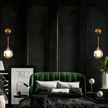 Emerald green velvet tufted headboard with modern gold glass ball wall lamp decorbites glass ball gold sconce background
