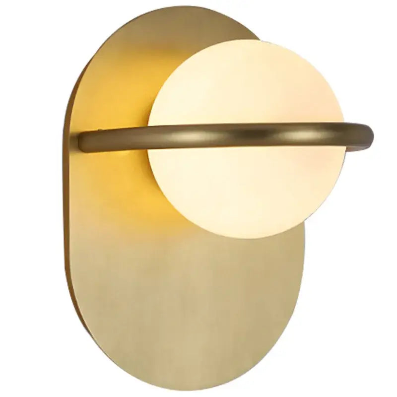 Modern gold glass ball wall light with brass sconce and circular frosted glass shade for elegant bedroom decorbites glass ball