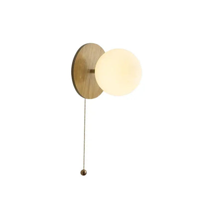 Modern gold glass ball wall lights with warm wooden backplate and softly glowing glass ball for bedroom decorbites wall lights
