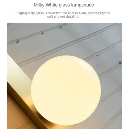 Modern gold glass ball wall sconce with milky white glass ball diffuser for soft bedroom lighting decorbites glass ball wall