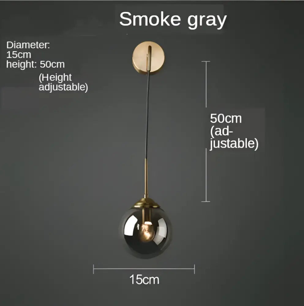 Modern gold glass ball wall sconce light fixture with smoke gray spherical pendant and brass-finished adjustable height decorbites glass ball decor