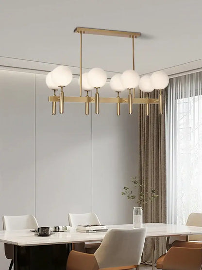 Modern gold glass balloon chandelier with spherical white glass shades ideal for dining room decorbites glass balloon