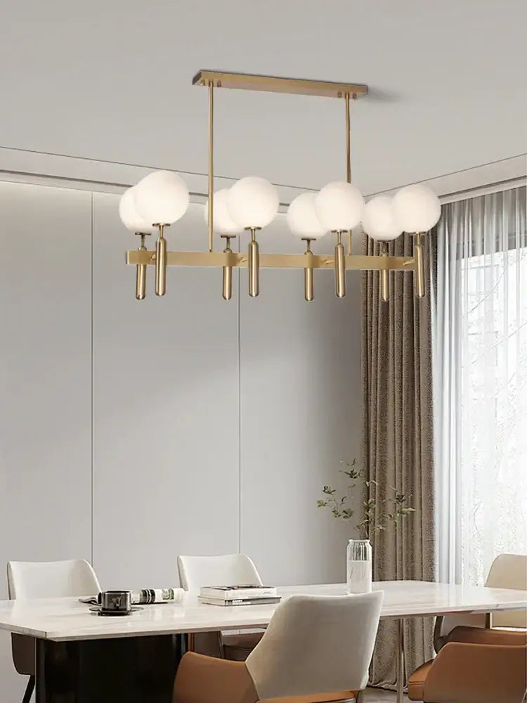 Modern gold glass balloon chandelier with spherical white glass shades ideal for dining room decorbites glass balloon