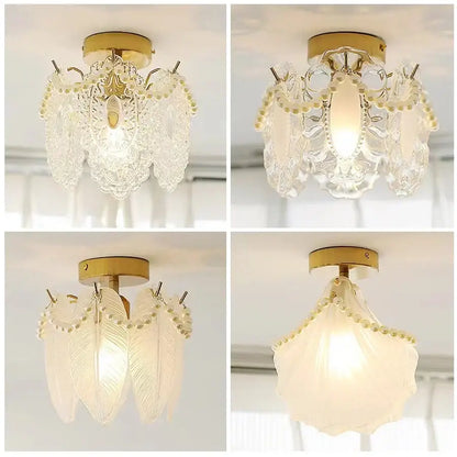 Modern gold glass shade ceiling light featuring a clear glass chandelier with gold metal accents and pearl embellishments