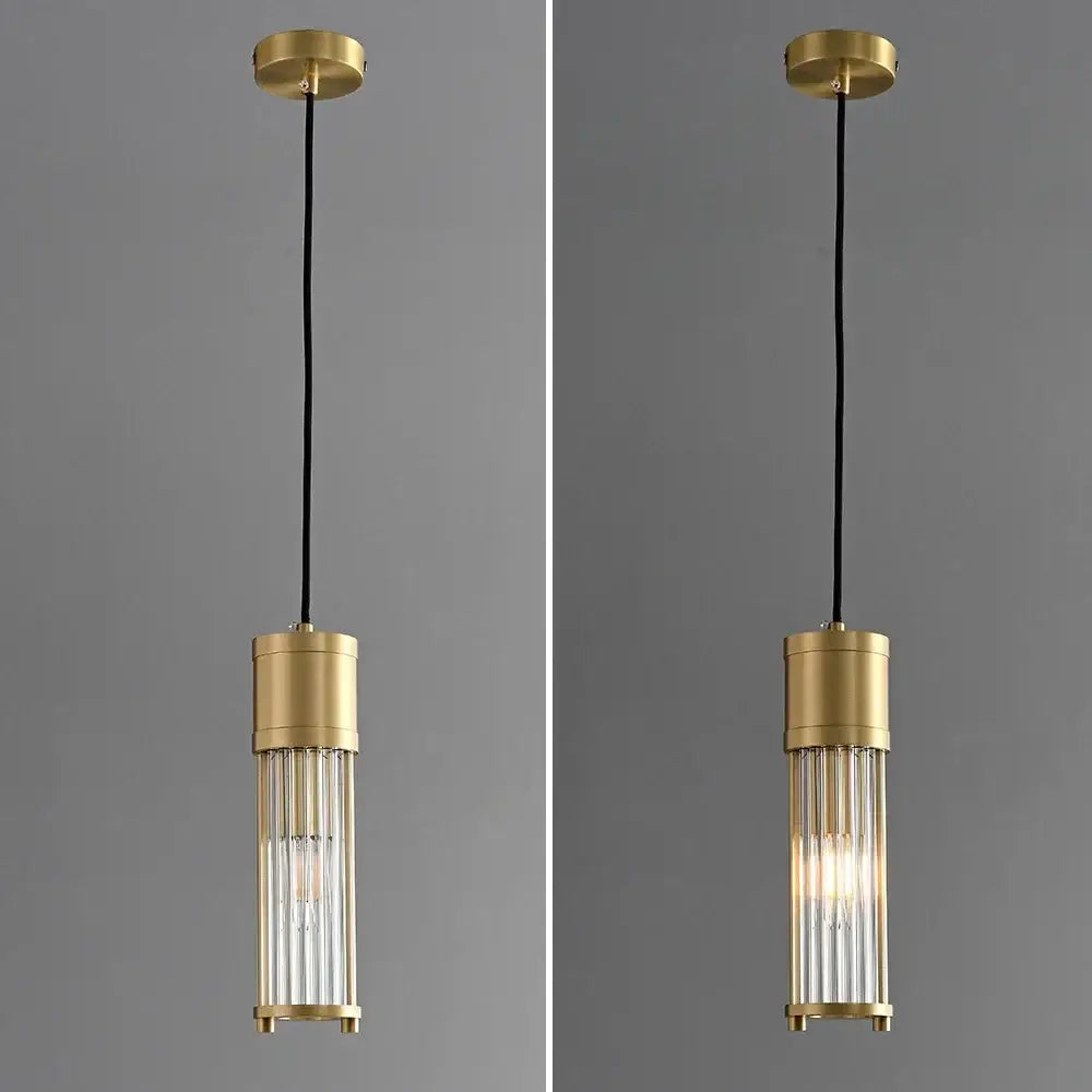 Modern gold glass shade pendant lights with cylindrical clear glass rods and black cord for kitchen island lighting