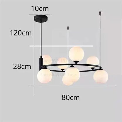 Modern black metal pendant light chandelier with eight frosted glass globe lights suitable for dining room use