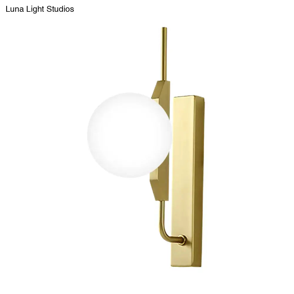 Modern gold globe wall sconce with frosted glass globe and geometric metal accents for 110v-120v or 220v-240v use
