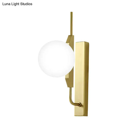 Modern gold globe wall sconce with frosted glass globe and geometric metal accents for 110v-120v or 220v-240v use