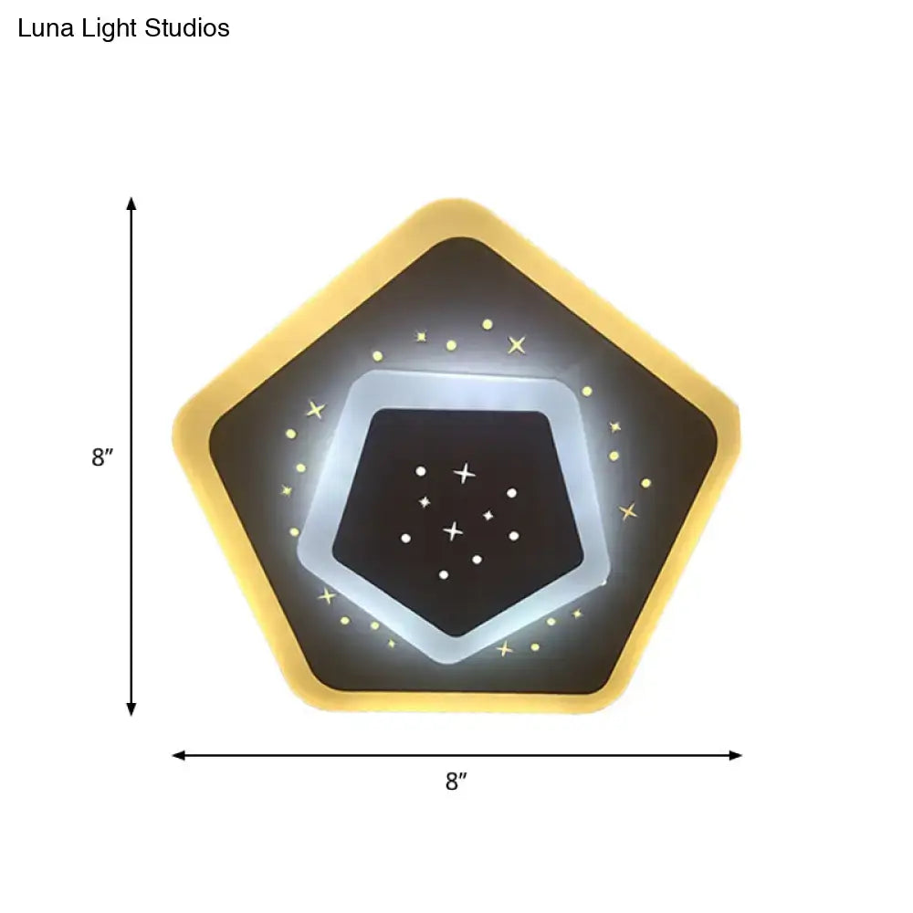 Modern gold heart pendant wall light with warm yellow frame and star-patterned black center featuring rhombus star design