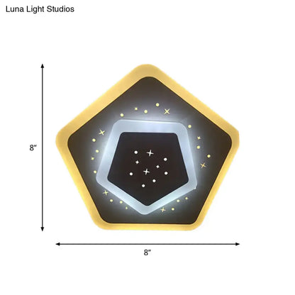 Modern gold heart pendant wall light with warm yellow frame and star-patterned black center featuring rhombus star design