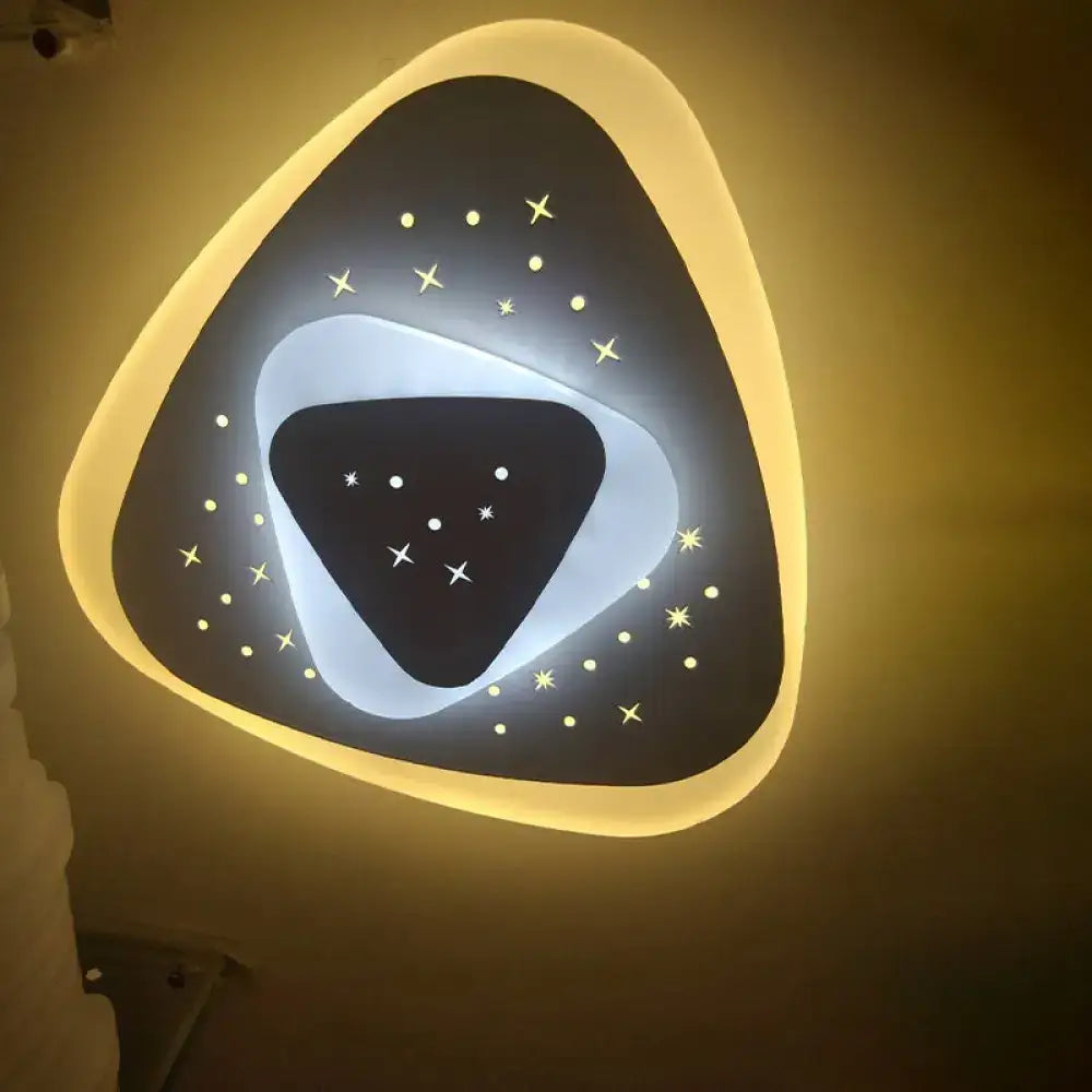 Modern gold heart pendant wall light with triangle rhombus star design and warm glow for bedroom decor