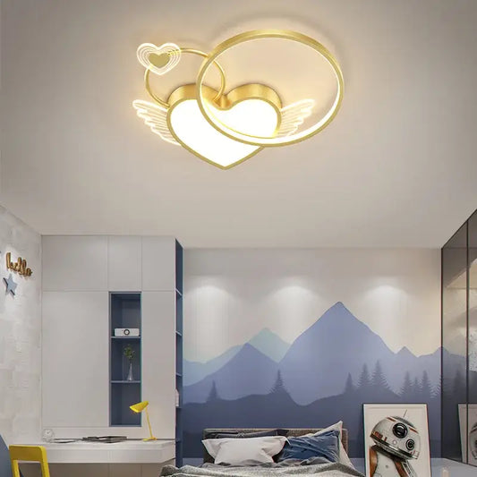 Modern gold heart shape led ceiling light with wings in warm illumination ideal for bedroom decorbites heart shape