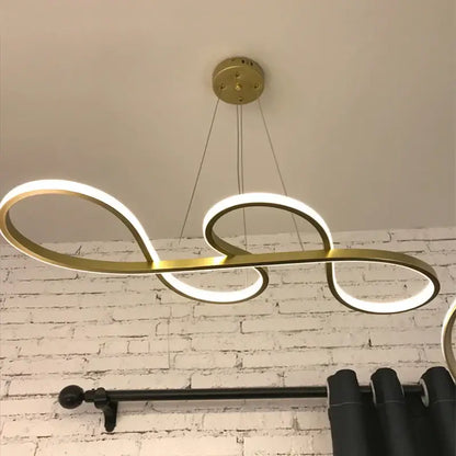 Gold-finished modern infinity loop led pendant lights by decorbites elegant pendant for stylish dining room decor