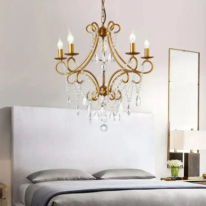 Antique brass decorbites iron crystal chandelier with five candle-style bulbs and dangling crystal droplets for luxury lighting