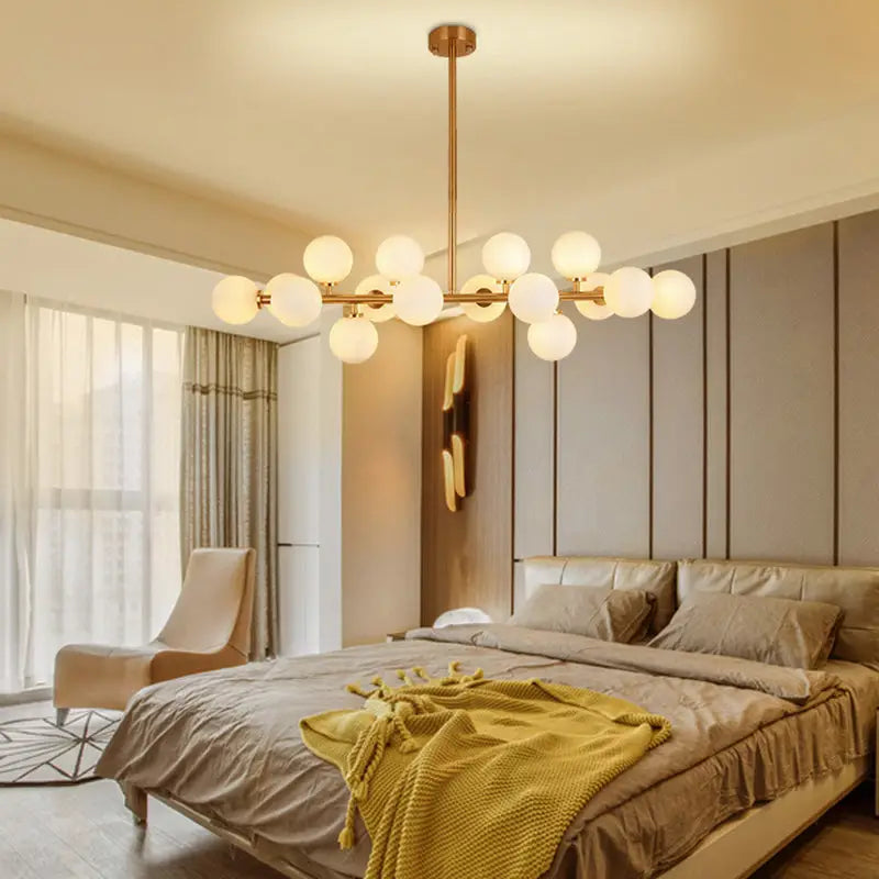 Modern gold island pendant light with frosted glass globe bulbs suitable for 220v-240v and 110v-120v use