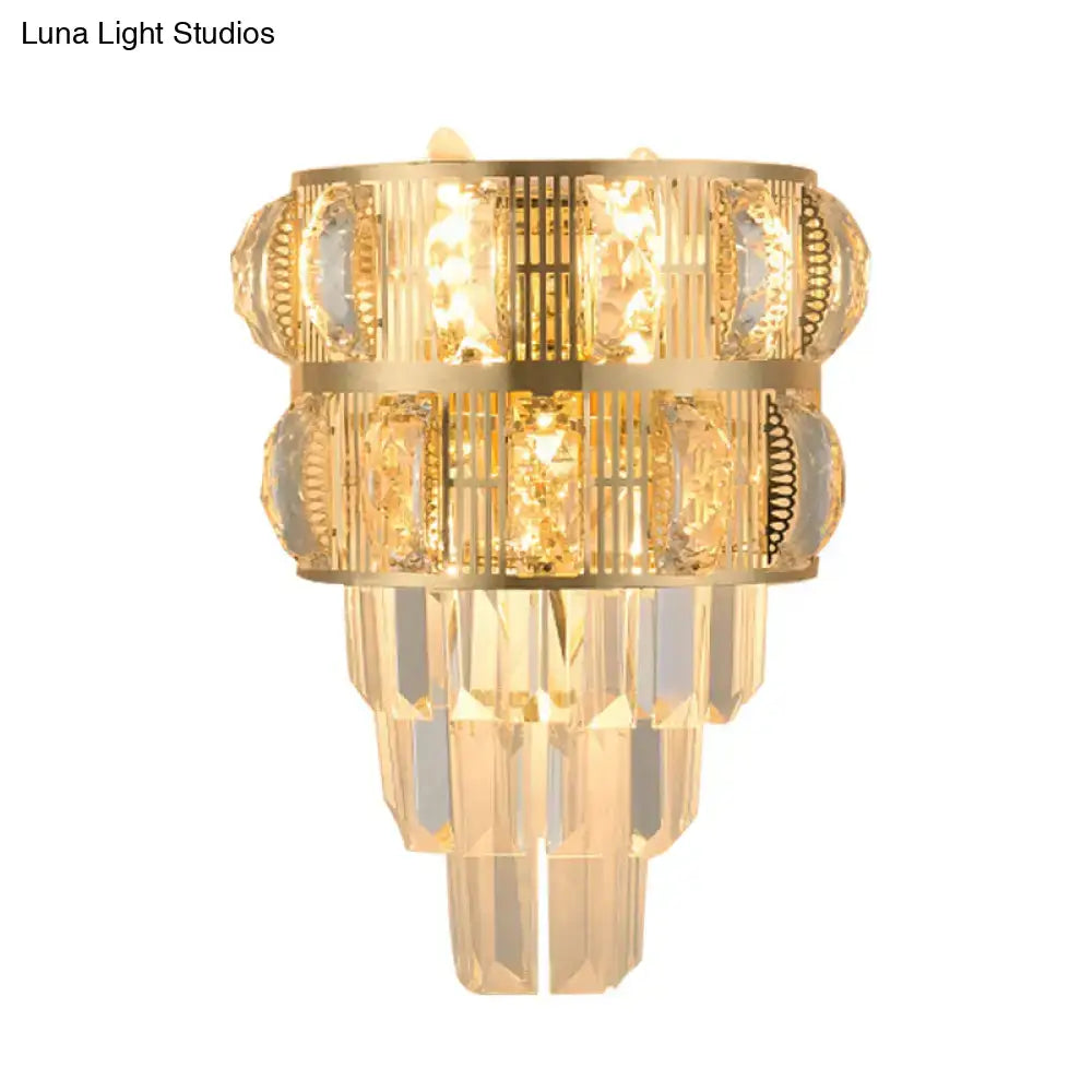 Modern gold wall lamp with clear k9 crystal tiered accents and vertical bar detailing for living room lighting type