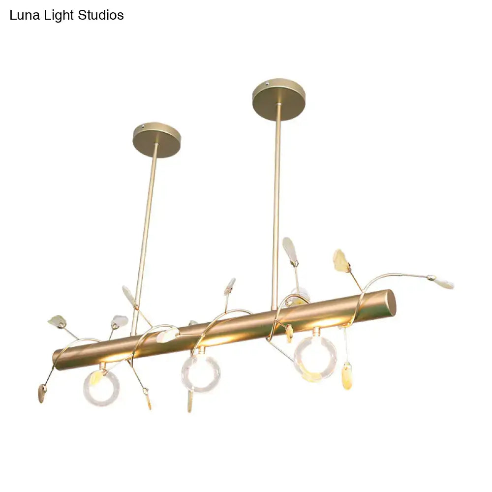 Gold-toned decorbites contemporary 3-light ceiling pendant with slender arms and clear glass accents for 110v-120v use