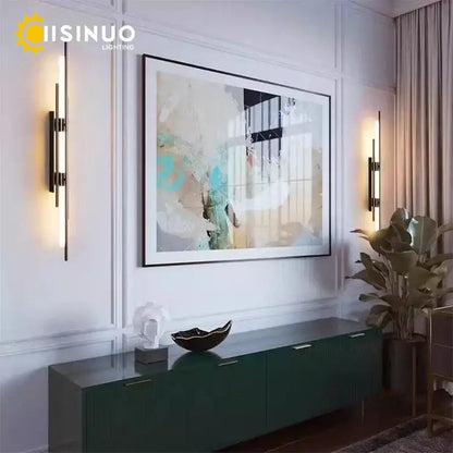 Modern gold led long liner wall sconce with black metal vertical bars and warm light for living room decorbites led long