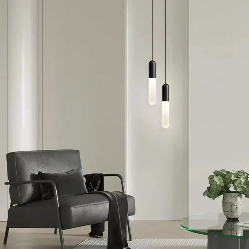 Modern black and frosted glass pendant lamp with sleek cylindrical design for decorbites gold led bedroom lighting
