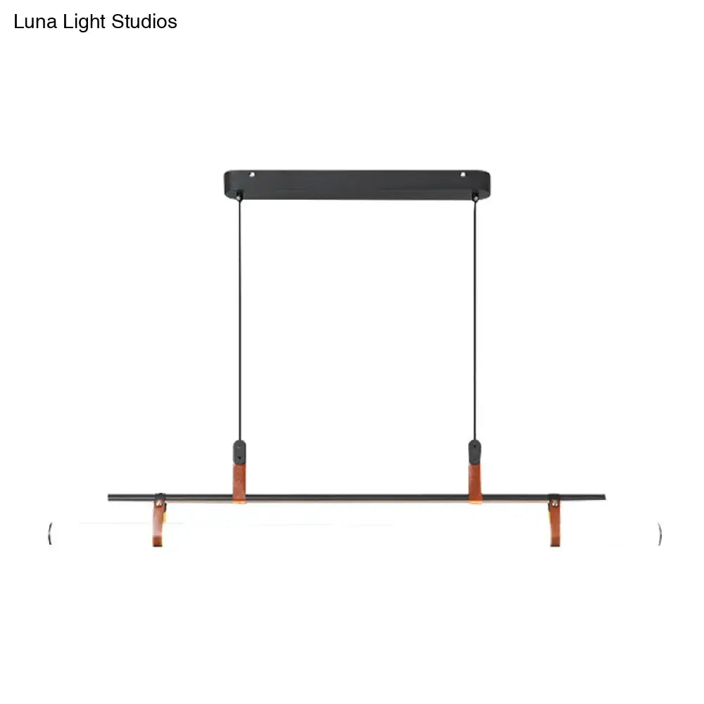 Black metal hanging clothesline with brown leather accents and adjustable cords for dining room use