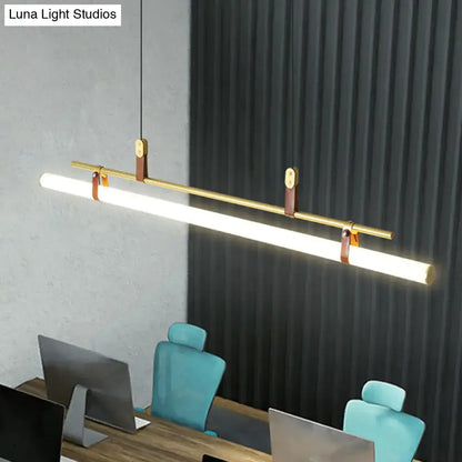 Modern gold led pendant light with brass finish leather straps and minimalist design for dining room lighting