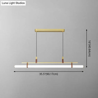 Modern gold led pendant light with leather features a sleek gold metal frame and white led strip for dining room lighting