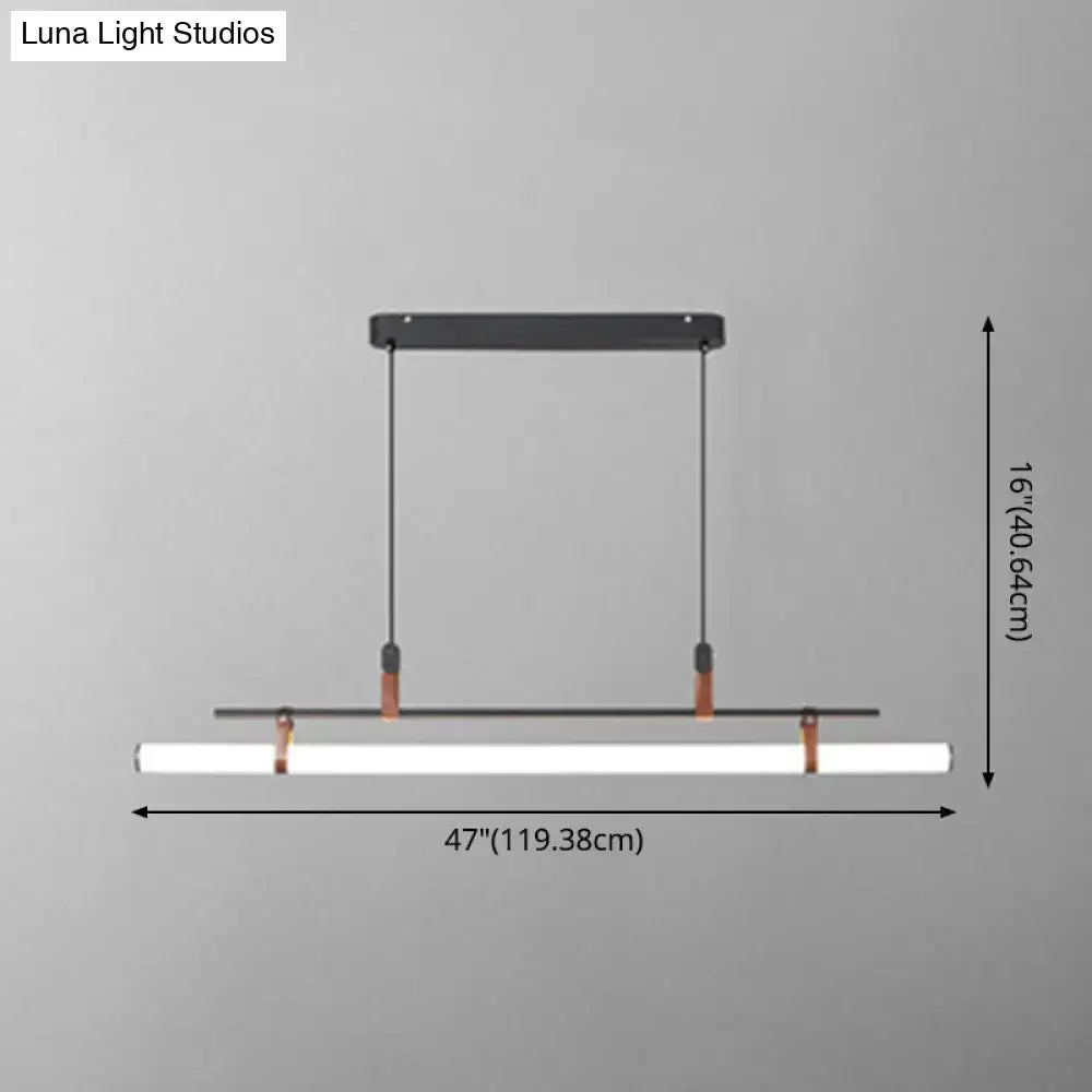 Modern gold led pendant light with leather and copper hardware featuring a white cylindrical led lamp for dining room use