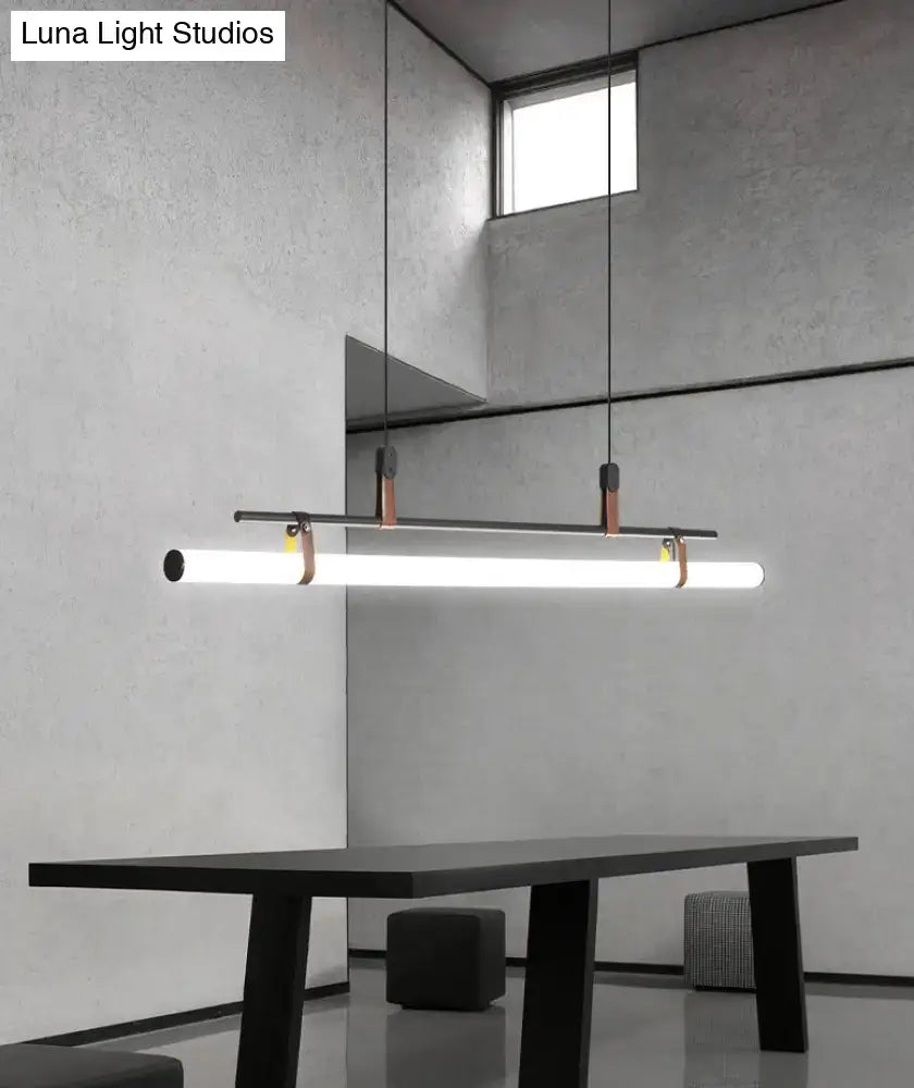 Modern gold led pendant light with sleek white cylindrical tube, copper brackets, and leather cords for dining room lighting