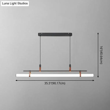 Modern gold led pendant light with black metal frame copper accents and leather for dining room illumination
