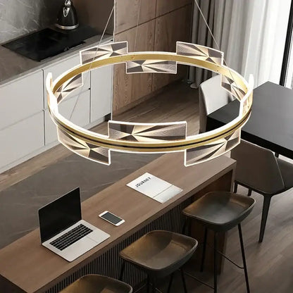 Modern gold led pendant light with geometric cutouts and integrated led lighting for dining room decorbites gold led