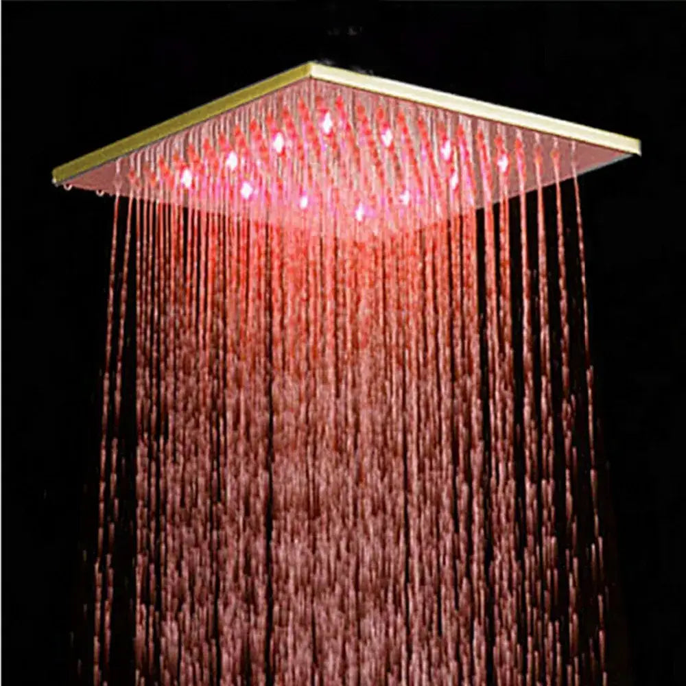 Modern gold led rainfall shower head with square shape and red led lights emitting cascading water streams decorbites gold led