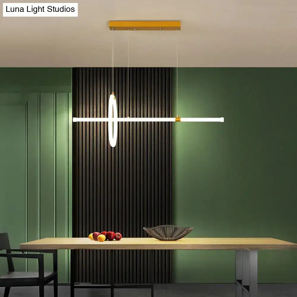 Modern minimalist DecorBites gold LED hanging lamp with white illuminated ring and gold accents for dining room use